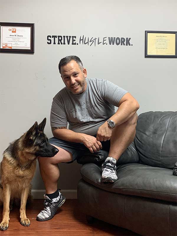 Alex the dog trainer with a client's dog